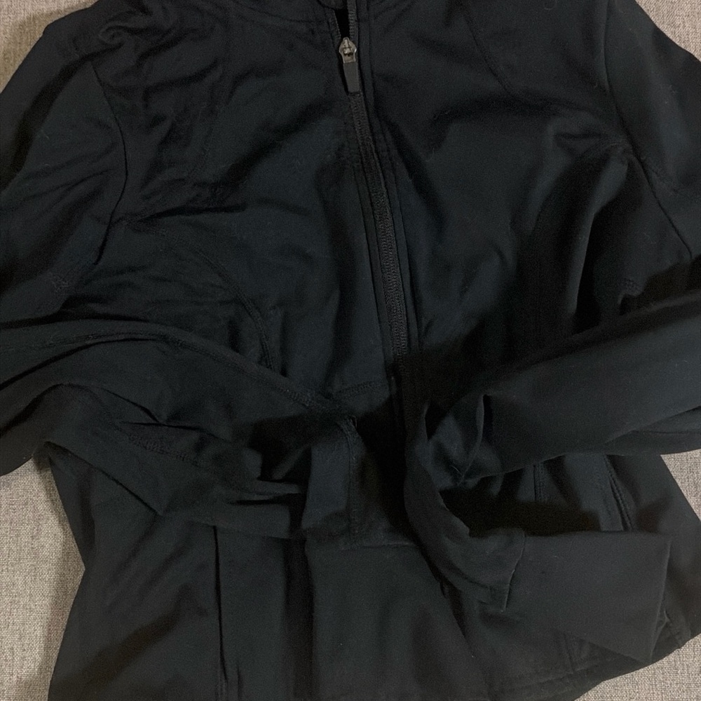 Women's Fabletics cropped train jacket size MEDIUM